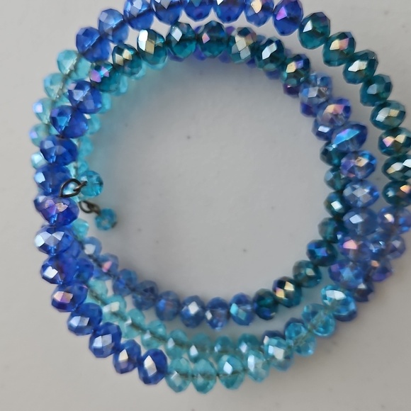 CRYSTAL AB LIGHT BLUE & MEDIUM BLUE Beads on Wire Bracelet. 2 1/2" Dia. - Picture 4 of 6